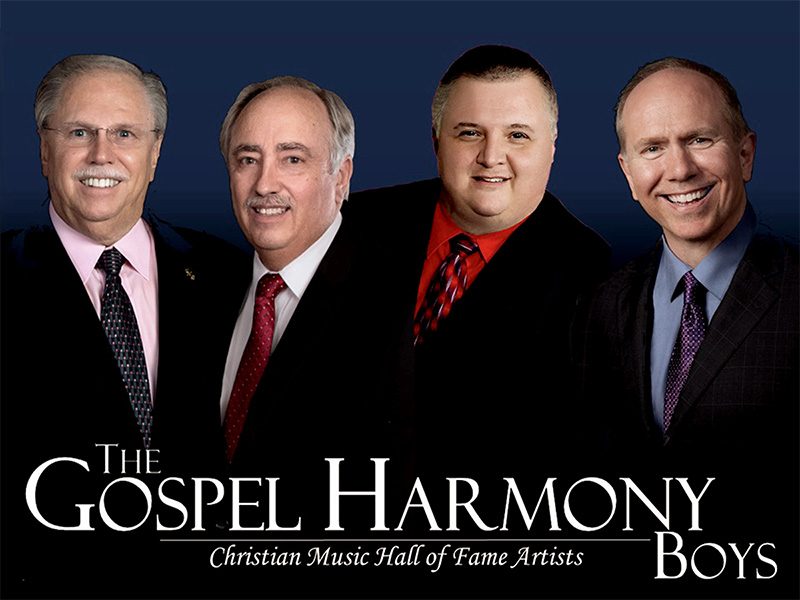 Group shot of Gospel Harmony Boys on dark background with group logo below headshots